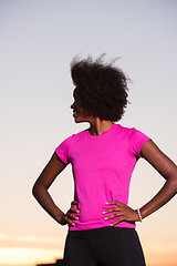 Image showing Portrait of a young african american woman running outdoors