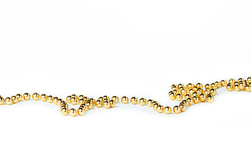 Image showing Gold Christmas bump beads on white