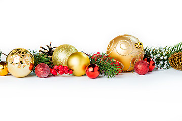 Image showing Gold Christmas balls on white