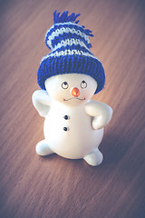 Image showing Cute Snowman on Wooden Table