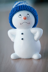 Image showing Cute Snowman on Wooden Table