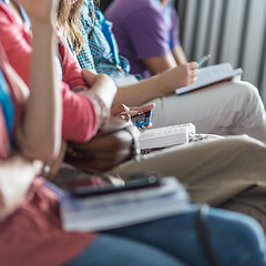 Image showing Participants listening to lecture and making notes