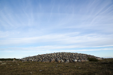 Image showing An ancient burial place with a heap of stones