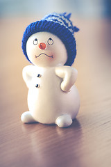 Image showing Cute Snowman on Wooden Table