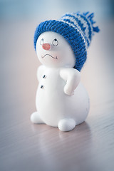 Image showing Cute Snowman on Wooden Table