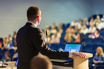 Image showing Public speaker giving talk at business event.