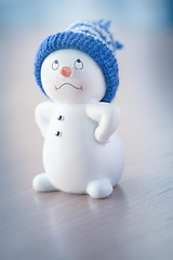 Image showing Cute Snowman on Wooden Table