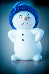 Image showing Cute Snowman on Wooden Table