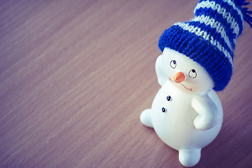 Image showing Cute Snowman on Wooden Table