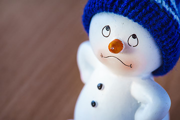 Image showing Cute Snowman on Wooden Table