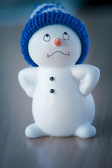 Image showing Cute Snowman on Wooden Table