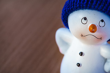 Image showing Cute Snowman on Wooden Table