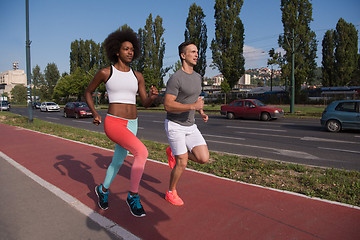 Image showing multiethnic group of people on the jogging