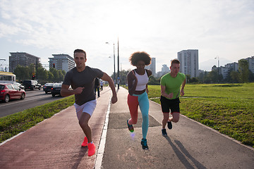 Image showing multiethnic group of people on the jogging