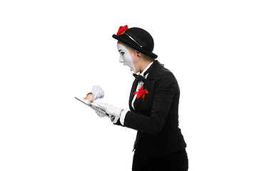 Image showing business woman in the image mime holding tablet PC