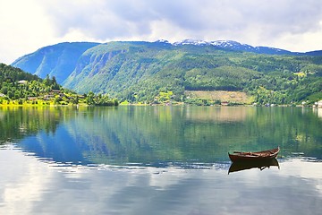 Image showing Rowboat in fjord. Ulvik, Norway.