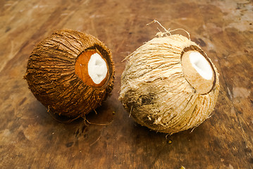 Image showing Two coconuts on table