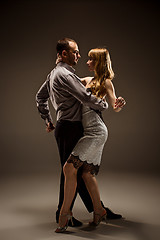 Image showing The man and the woman dancing argentinian tango