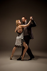 Image showing The man and the woman dancing argentinian tango