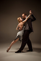 Image showing The man and the woman dancing argentinian tango