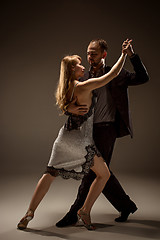 Image showing The man and the woman dancing argentinian tango