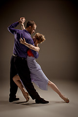 Image showing The man and the woman dancing argentinian tango