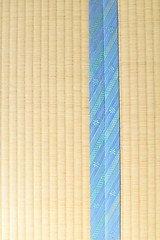 Image showing Tatami with light blue edging, ribbon