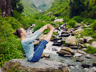 Image showing Woman doing Ashtanga Vinyasa Yoga asana outdoors