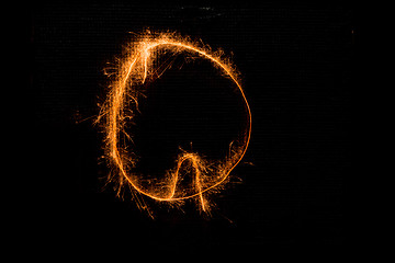 Image showing Letter Q made of sparklers on black