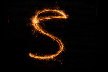 Image showing Letter S made of sparklers on black