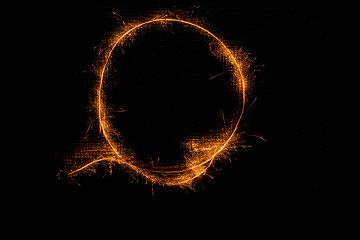 Image showing Letter O made of sparklers on black