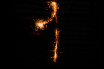 Image showing Number 1 made of sparklers on black
