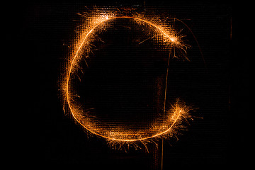 Image showing Letter C made of sparklers on black