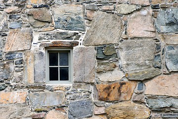 Image showing Old stone wall and small window
