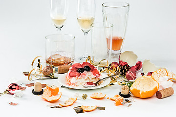 Image showing The morning after christmas day, table with alcohol and leftovers