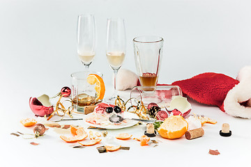 Image showing The morning after christmas day, table with alcohol and leftovers