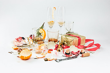 Image showing The morning after christmas day, table with alcohol and leftovers