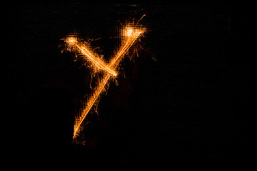 Image showing Letter Y made of sparklers on black