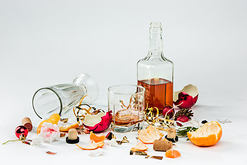 Image showing The morning after christmas day, table with alcohol and leftovers