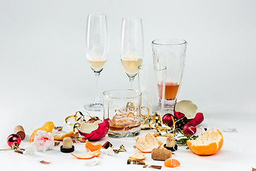 Image showing The morning after christmas day, table with alcohol and leftovers