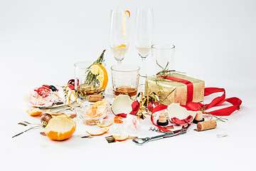 Image showing The morning after christmas day, table with alcohol and leftovers