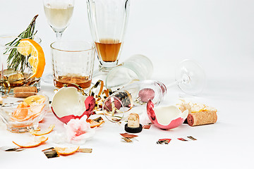 Image showing The morning after christmas day, table with alcohol and leftovers