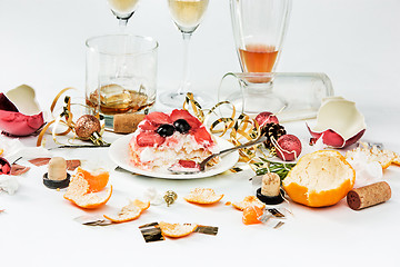 Image showing The morning after christmas day, table with alcohol and leftovers