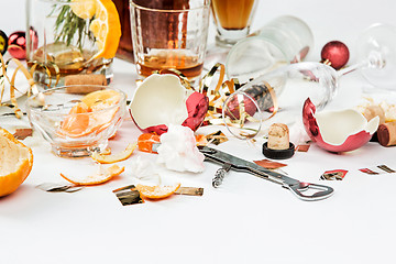 Image showing The morning after christmas day, table with alcohol and leftovers