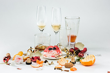 Image showing The morning after christmas day, table with alcohol and leftovers