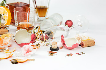 Image showing The morning after christmas day, table with alcohol and leftovers