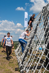 Image showing Team storms net wall in extrim race. Tyumen.Russia