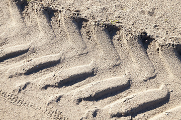 Image showing footprints in the sand truck