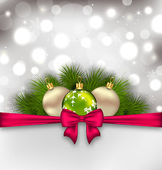 Image showing Christmas glowing card with fir branches and glass balls