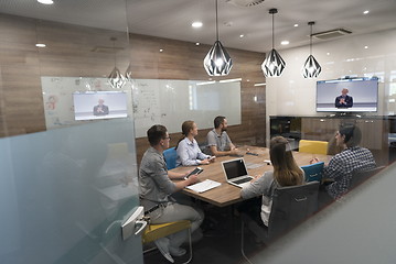 Image showing start up business people group attending videoconference call